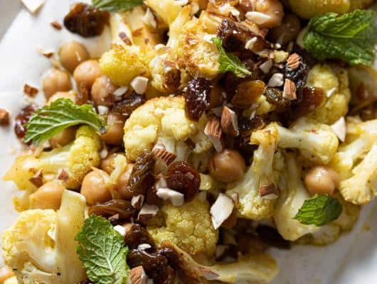 Delicious Chickpeas, Cauliflower, Curry Vinaigrette, and Spiced Yogurt