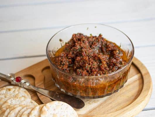 Sun-Dried Tomato Tapenade This wonderful recipe is what everyone should have in their repertoire for appetizers