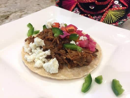 Smoky Pulled Pork Street Tacos with a jicama mango slaw will make your mouth happy