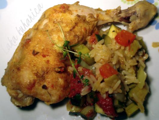 Chicken legs with rice and vegetables