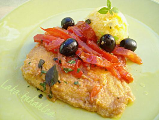 Cod with tomatoes, olives and polenta