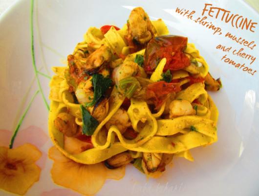 Fettuccine with shrimp, mussels and cherry tomatoes
