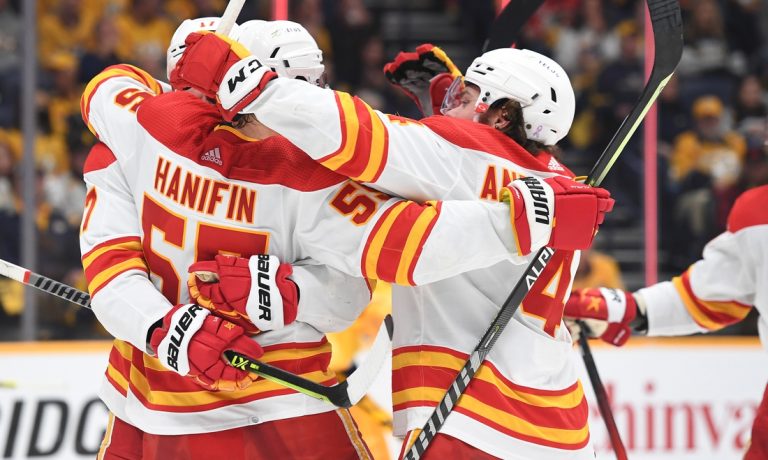 NHL roundup: Flames set team road win mark