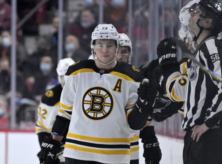 NHL fines Bruins’ Charlie McAvoy, Hurricanes’ Brendan Smith