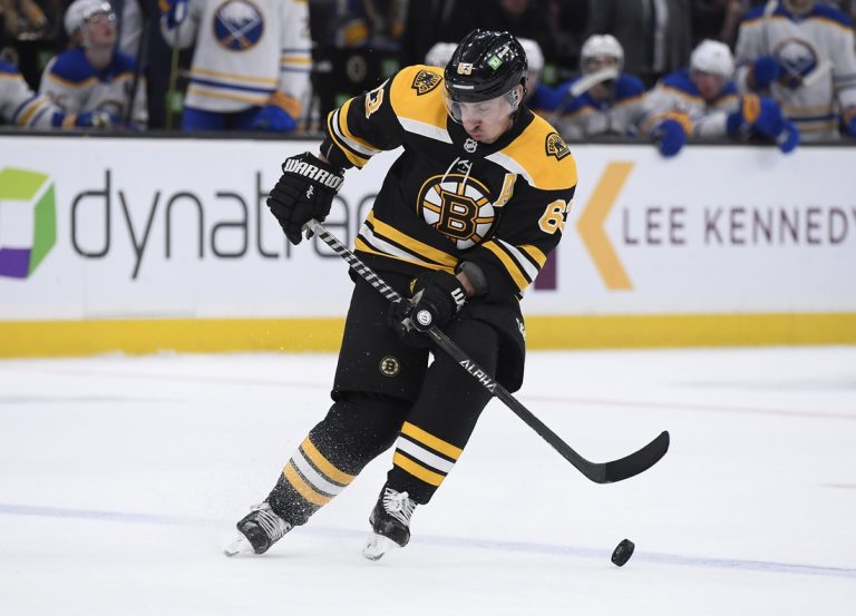 NHL roundup: Brad Marchand’s 5 points carry Bruins past Hurricanes