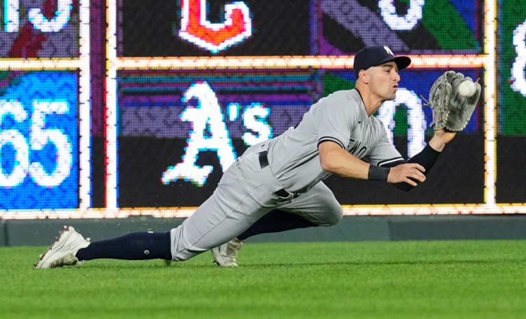 Yankees place OF Tim Locastro on IL with lat strain