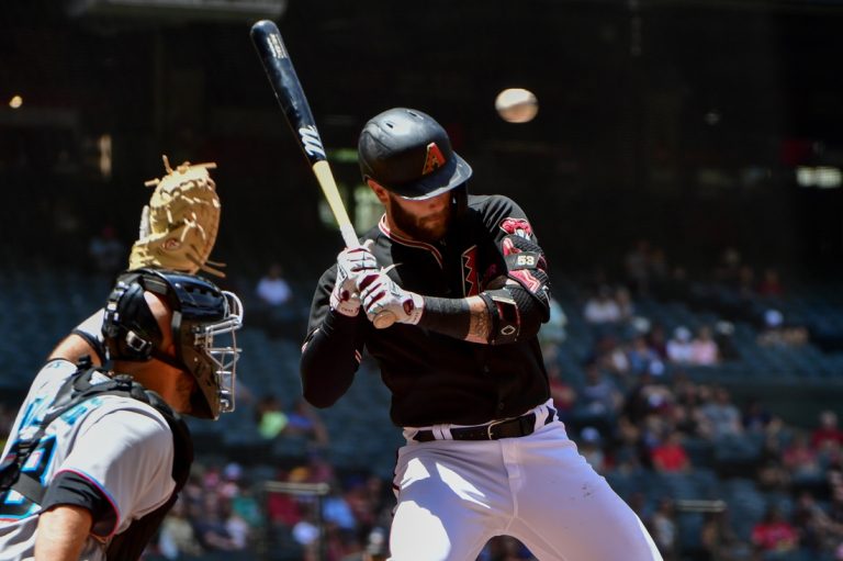 Marlins erupt in eighth to roll past Diamondbacks