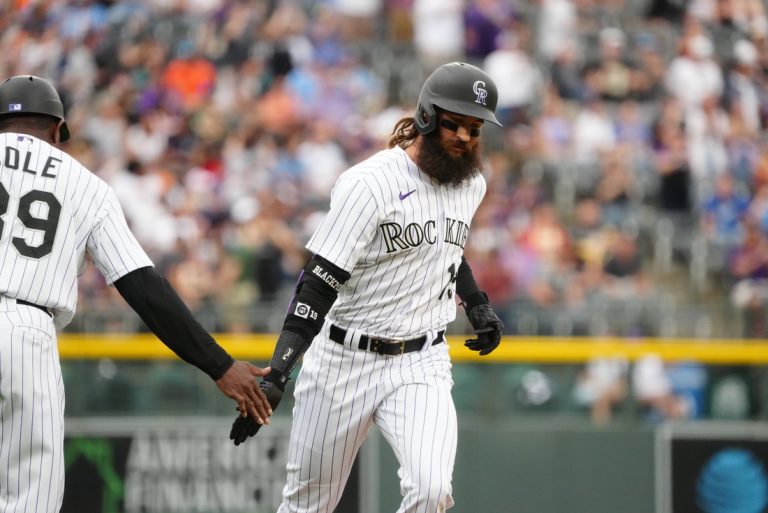Rockies rock Royals with early scoring, win 10-4