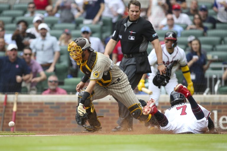 Padres take control in extra innings to upend Braves
