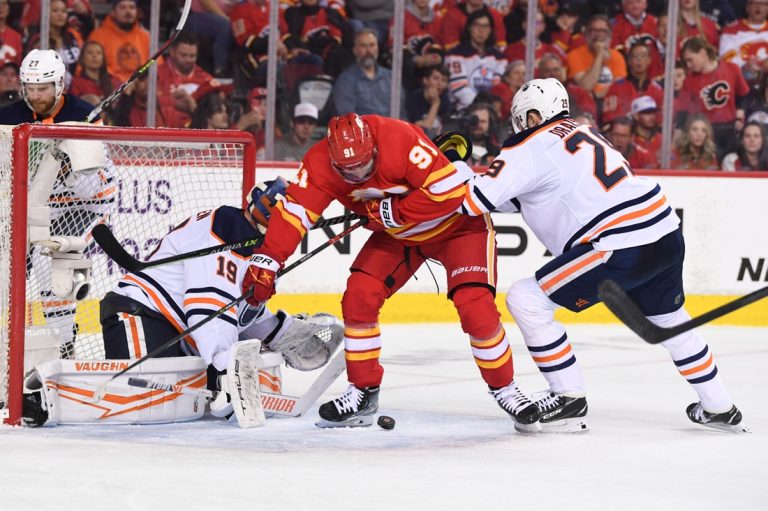 Flames take series opener vs. Oilers in high-scoring affair