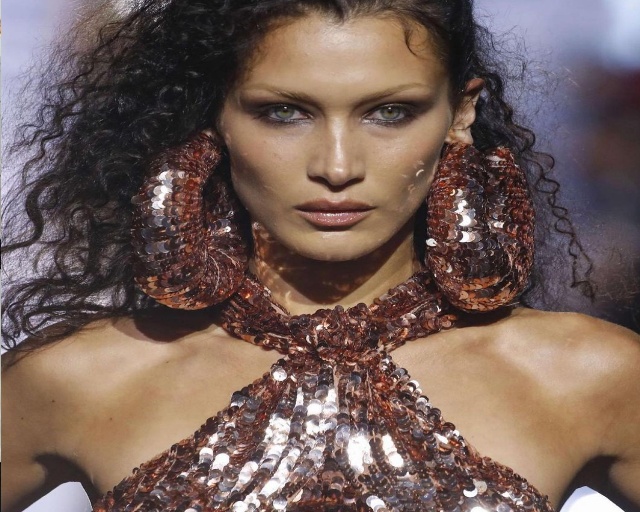 Celebrity model Bella Hadid sparkles like jewelry in crystal dress