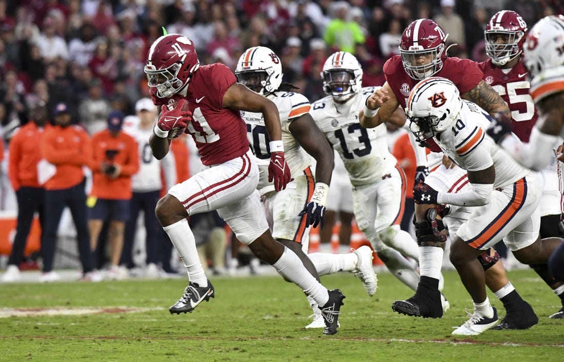 NCAAF News: No. 7 Alabama rolls past Auburn behind Bryce Young’s 4 TDs