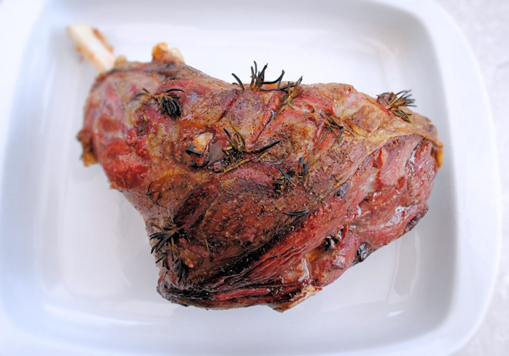 Roast leg of lamb with garlic and anchovies