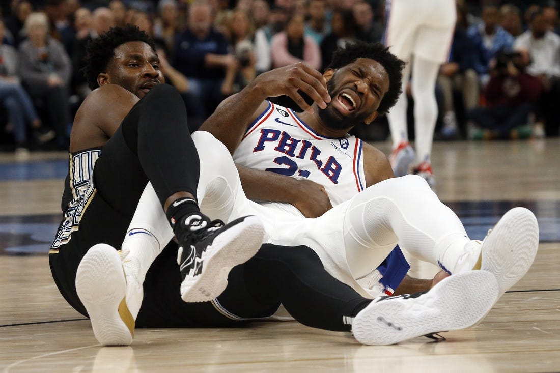 Grizzlies withstand late charge to win ninth-straight home game over 76ers