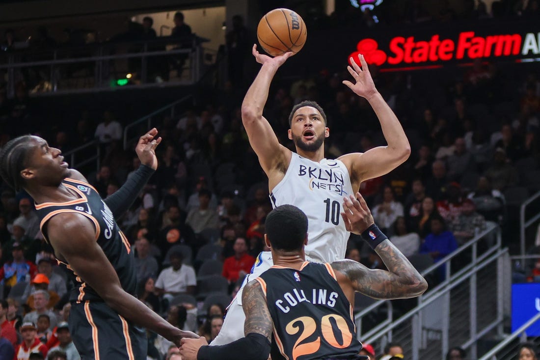 Nets survive late surge to clip Hawks, win 10th straight