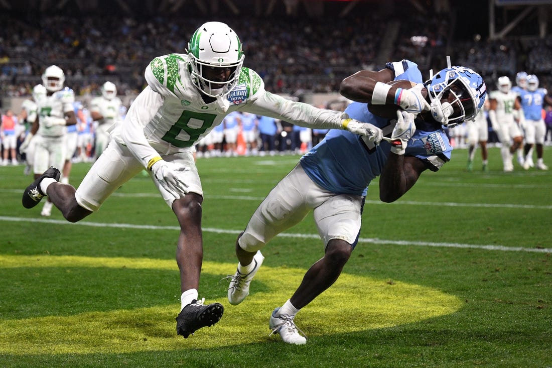 NCAAF News: No. 15 Oregon nips UNC in Holiday Bowl on last-minute TD