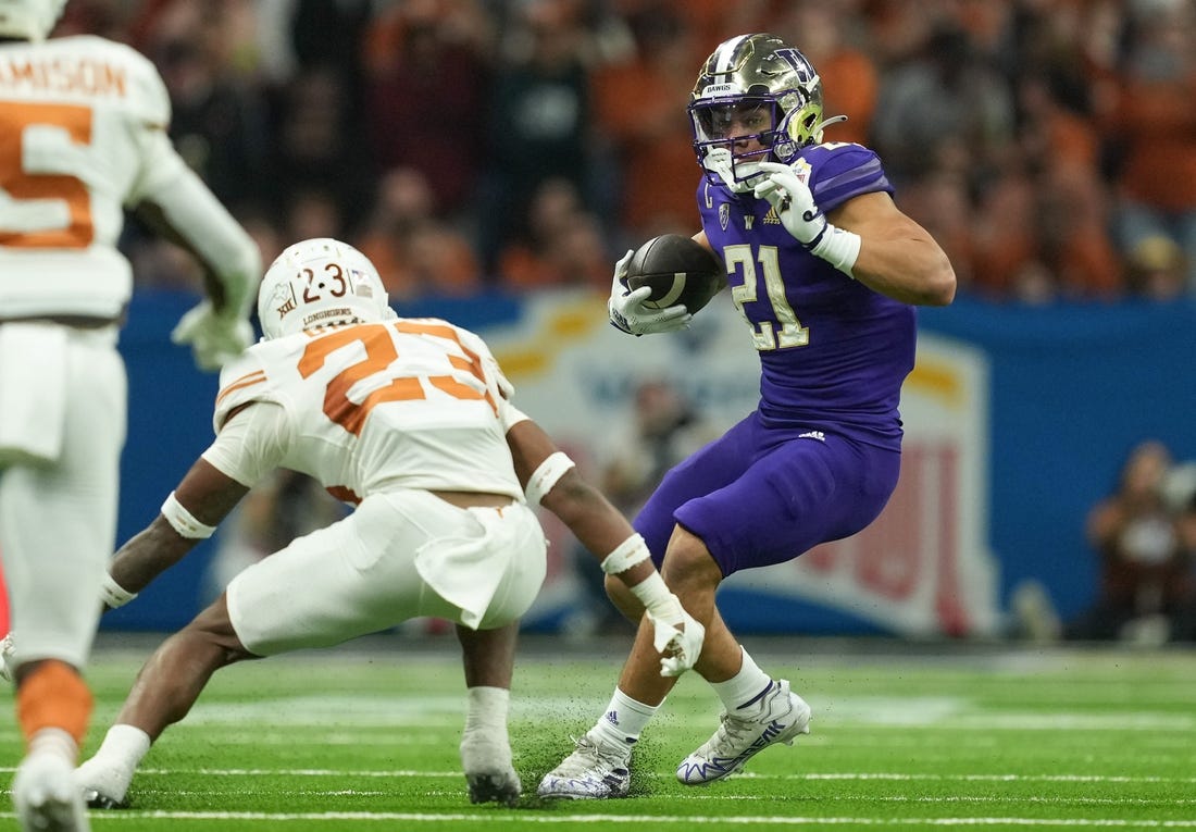 NCAAF News: No. 12 Washington hangs on to beat No. 20 Texas in Alamo Bowl