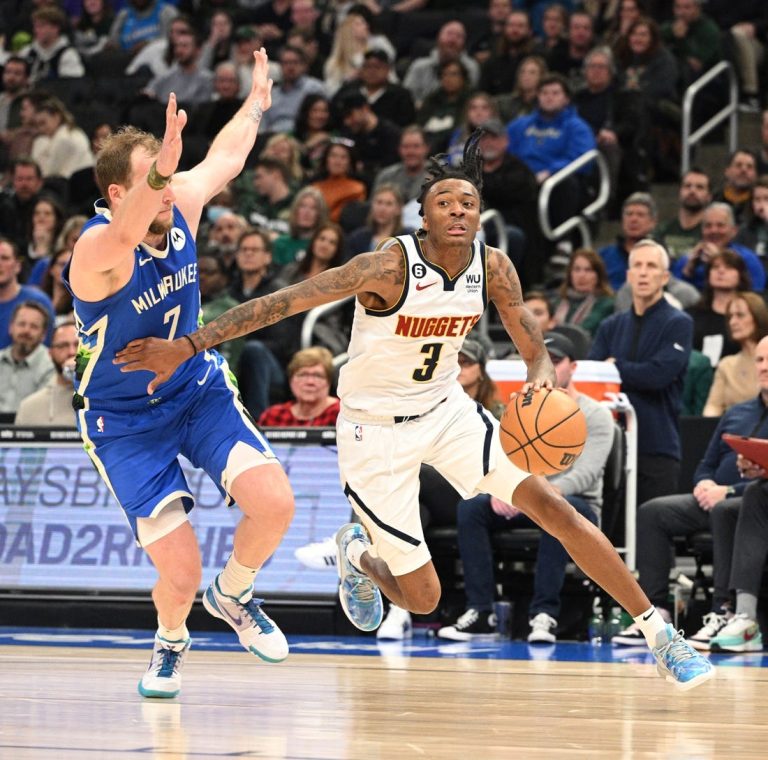 Nuggets put trade distractions aside, visit Magic