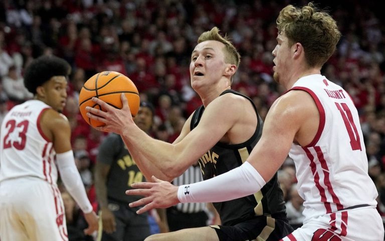 No. 5 Purdue holds off Wisconsin at the line