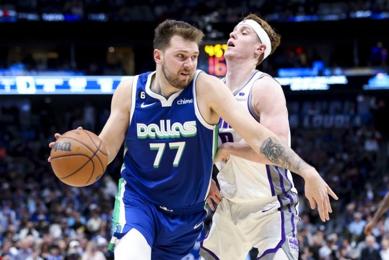 Mavs edge Kings, move into tie for 10th in West