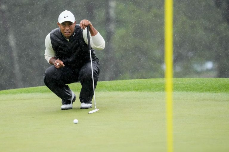 PGA News: Tiger Woods survives rough finish to make Masters cut
