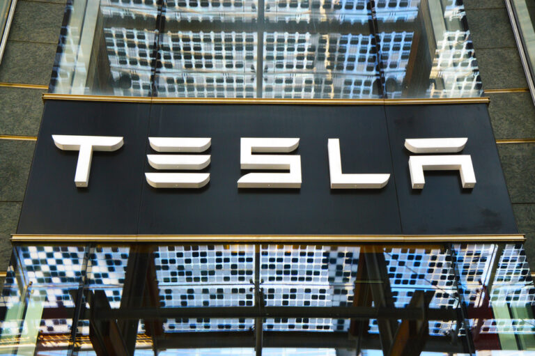 CWEB Business News-UBS Boosts Tesla Price Target on Robotaxi Optimism but Stays Cautious on Valuation
