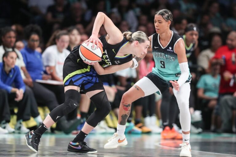 Wings star Paige Bueckers (back) questionable vs. Liberty