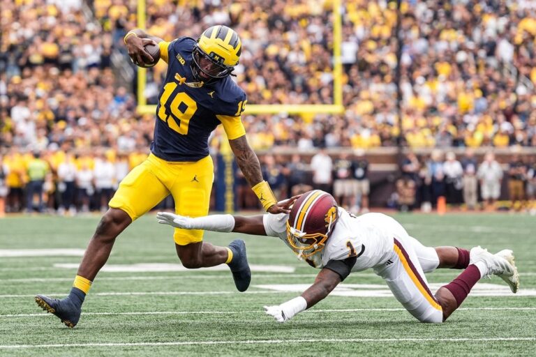 NCAAF News: Bryce Underwood helps No. 23 Michigan maul Central Michigan