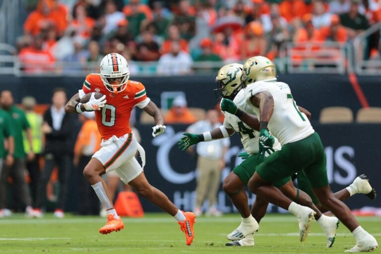 NCAAF News: No. 5 Miami handles upset-minded No. 18 South Florida