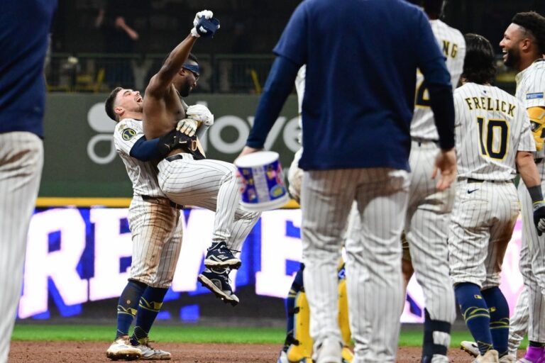 MLB News: After clinching playoff spot, Brewers rally past Cards in 10