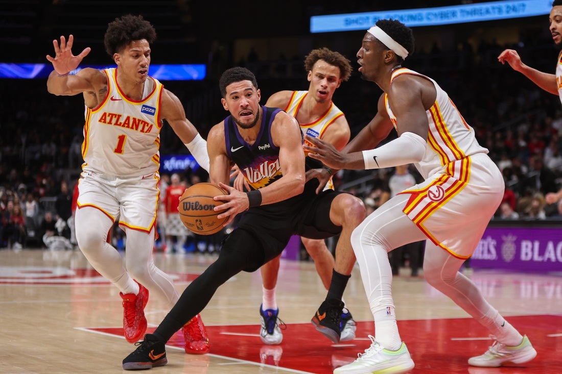 Hawks down Suns after Devin Booker exits with ankle injury - CWEB